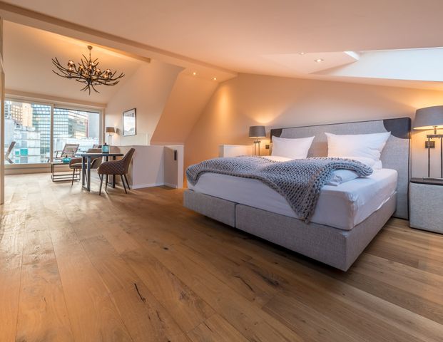 City-Residence: Tolle Penthouse-Wohnung mit Skylineblick und Dachterrasse - Foto 1