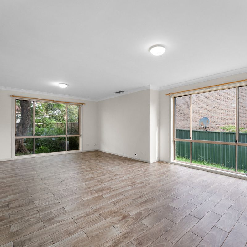 Modern Three Bedroom Townhouse With Unbeatable Convenience! - Photo 1