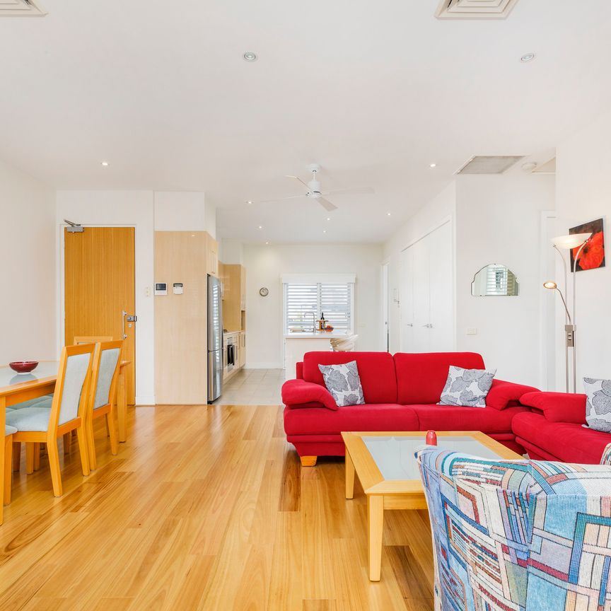 Top Floor Living in a Prime Location - Photo 1