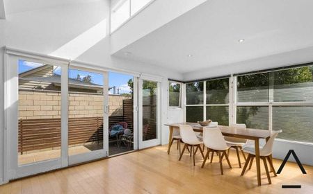 Stylish and Spacious Furnished Home with Private Garden and Modern Features - Photo 2