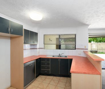 Charming Two-Bedroom Unit with Generous Private Courtyard in Secure... - Photo 3