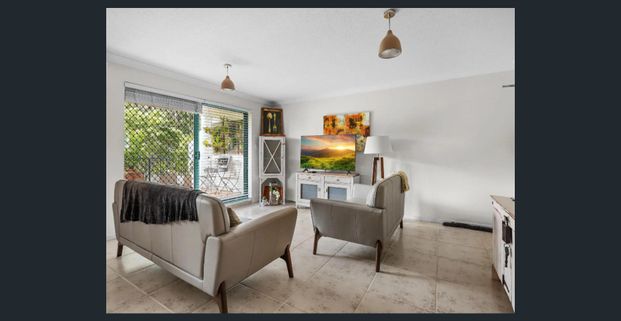 Modern Unit with Leafy Outlook - Photo 1