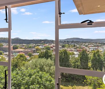 Stylish 1 Bedroom unit within mins of the CBD + off street parking - Photo 6