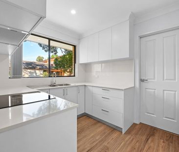 Renovated Two Bedroom Unit In Sought After Local - Photo 4