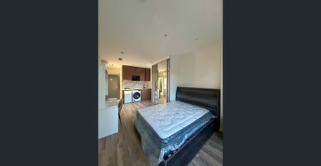 Brand New Fully furnished Studio -Light Rail at door - Photo 2