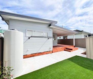 Fully Renovated Family Home with Air Conditioning - Photo 3