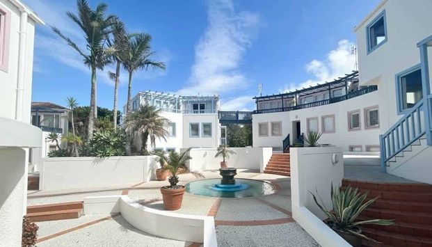 Coastal Charm Meets Mediterranean Style - Photo 1