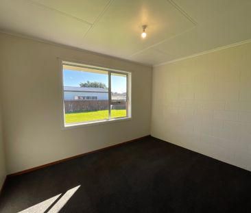 MIDDLE TWO BEDROOM UNIT IN WAITARA - Photo 4