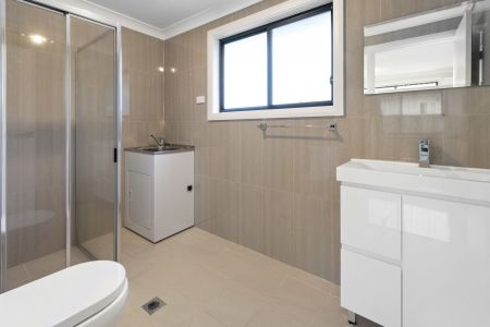 Modern & Spacious 2-Bedroom Granny Flat with Garage Storage - Photo 5