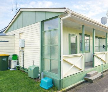 This charming one-bedroom unit offers comfortable, easy living with... - Photo 3