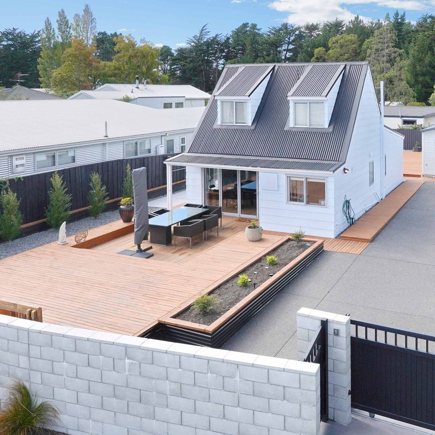 Modern Beachside Living - 3-Bedroom Home in Waikuku Beach - Photo 1