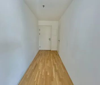 moderne 1,5 Zimmer Wohnung im 15.OG mit großzügiger Freifläche - Co-Working / Fitnesscenter / Dachterrasse inklusive! - Foto 3