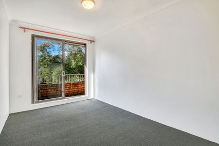 Top Floor, Immaculately Presented 2 bedroom Unit - Photo 5