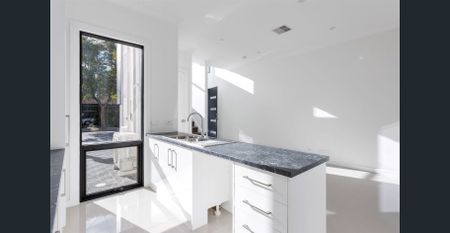 A beautiful home with a double garage, short drive to city and the bay - Photo 5