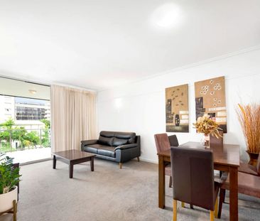 Inner-city Apartment with Resort-Style Living! - Photo 1