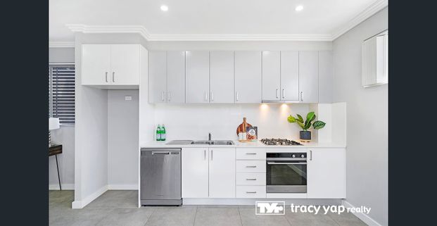 Modern Mid-Floor Two Bedroom Apartment in Prime Location - Photo 1