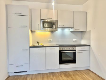 Hochwertige 2-Zimmer-Wohnung mit Outdoor-Bereich & offener Küche - Foto 5