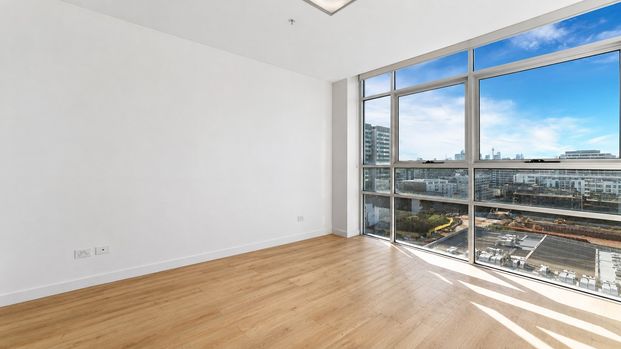Opposite East Village I Level 12 with City View - Photo 1