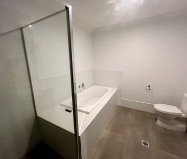 ALMOST NEW MODERN DUPLEX! - Photo 2