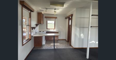 Right in the heart of town - Photo 4