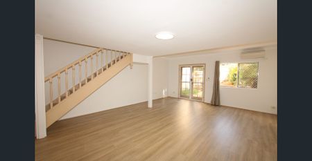 Two Ensuite Bedrooms, Balcony and Private Yard! - Photo 2