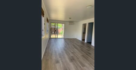 Modern Comfort & Great Convenience in the Heart of Campbelltown 3 Bedrooms I 1 Bathroom I Garage + Carport - Photo 2