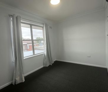 Neat & Convenient 2-Bedroom Unit - Photo 3