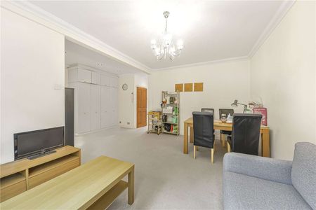 A well‑presented two bedroom apartment situated on the first floor - Photo 2