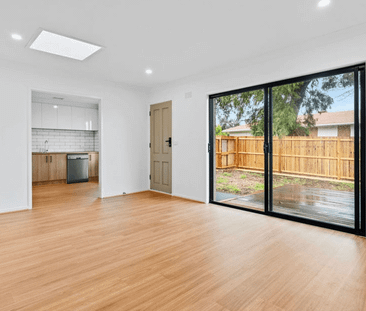 Beachside Living with Modern Comfort and Convenience - Photo 1