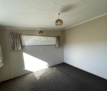 Spacious Three-Bedroom Home in Desirable Location - Photo 4