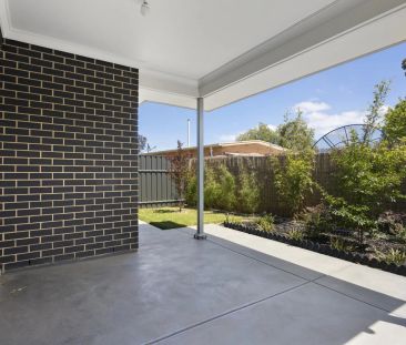 Modern Family Home with Solar, Secure Parking & Low-Maintenance Living - Photo 2