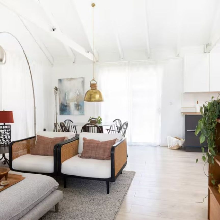 Coastal Charm Meets Convenience Close to the Beach & Shops - Photo 1
