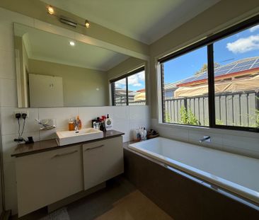 Spacious 4-Bedroom Home with Two Living Areas and Modern Upgrades - Photo 2