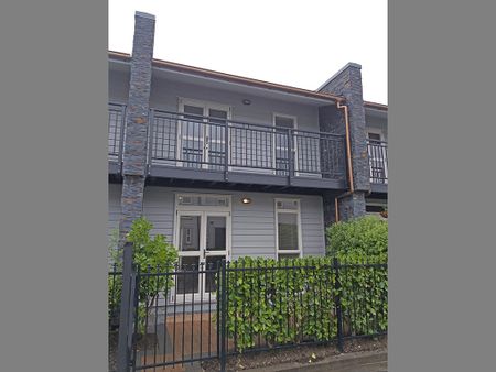 Townhouse Living in fully gated complex with 2 carparks - Photo 5