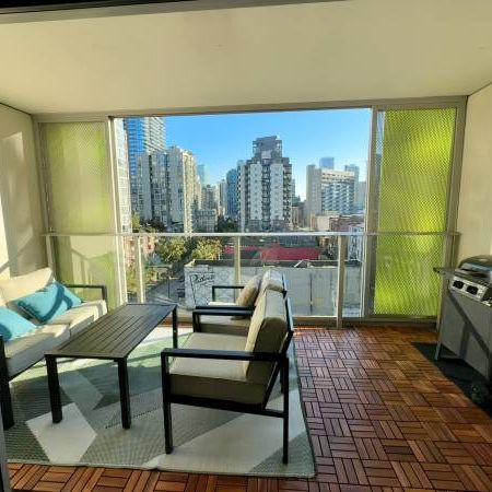 1 Bed + Den w/ Large Indoor-Outdoor Space – Pet-Friendly, Furnished - Photo 1