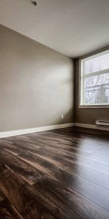 Modern 2bd1ba condo w/ walking distance to SkyTrain, groceries, & food - Photo 1