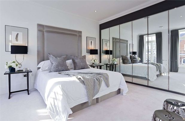 A well-appointed townhouse offering the highest specification of furnished accommodation, set across 4 floors. Featuring communal gym, gated access and concierge. - Photo 1