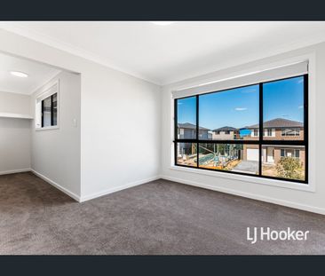 Stunning 4-Bedroom Home! - Photo 1