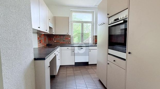 GROSSZÜGIGES WOHNEN AUF ZWEI ETAGEN MIT GARTEN - Foto 1