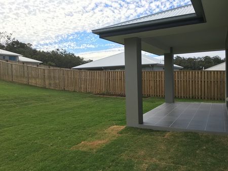 Family Home in Coomera Springs with Several Living Areas and Large Yard - Photo 3