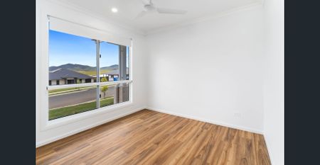 Brand New Home – Elevated Living with Stunning Mountain Views - Photo 3