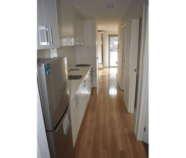 Secure 2-Bedroom Apartment with Cafes, Shops & Transport at Your Do... - Photo 6