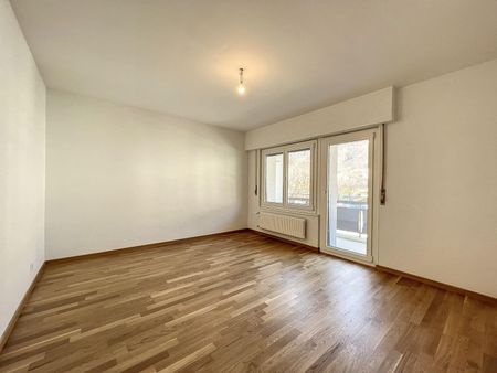 Appartement lumineux de 3.5 pièces au 2ème étage situé dans un quartier calme et verdoyant. - Photo 2