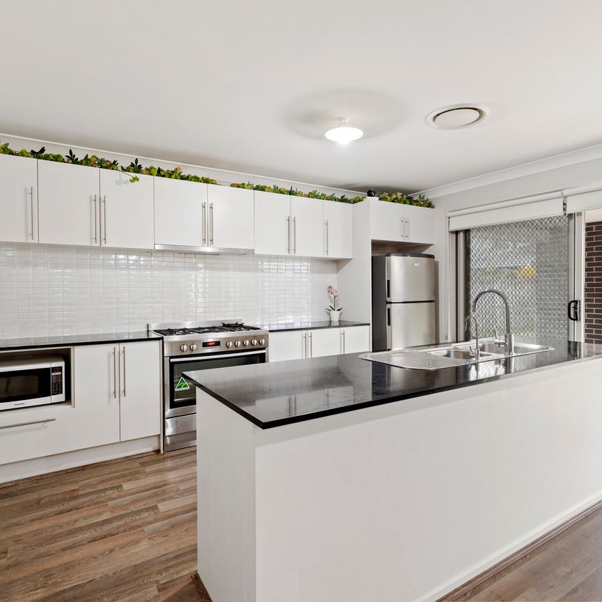 36 Diamond Hill Circuit, Edmondson Park NSW 2174 - House For Rent | Domain - Photo 1