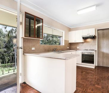 Five-Bedroom Multi-Level Family Home with Expansive Lawn - Photo 1