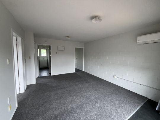 This freshly renovated two-bedroom downstairs unit at 5/25a Abbotsford offers easy, low-maintenance living in a great location. - Photo 1