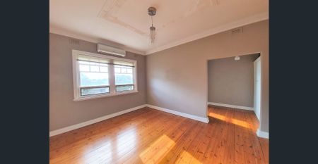 One Bedroom Upstairs Apartment Oozing Charm and Style - Photo 2