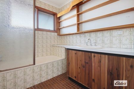 Charming 4-Bed, 2-Bath Home with Modern Upgrades & Spacious Backyard - Photo 4