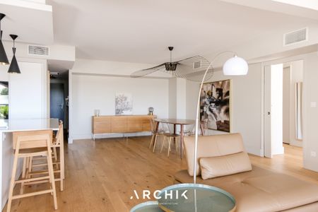 Architecture contemporaine, cette petite copropriété de 3 lots construite en 2020 et située en première ligne accueille un appartement de 140 m2 ouvert sur un beau jardin privatif d'environ 150 m2 en plein coeur du quartier de l'Aiguillon. - Photo 2