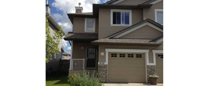 Absolutely Gorgeous 1700 sqft Duplex with POND FRONT & GREEN BACK | 1639 MelRose Place, Edmonton - Photo 1